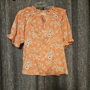 Coral ruffled blouse